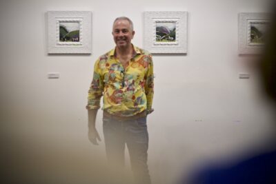 Guy Chapman at the opening of landscape exhibition named Ngā Puke o Aotearoa