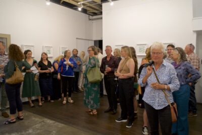 The crowd at the opening of Guy Chapman's landscape exhibition named Ngā Puke o Aotearoa